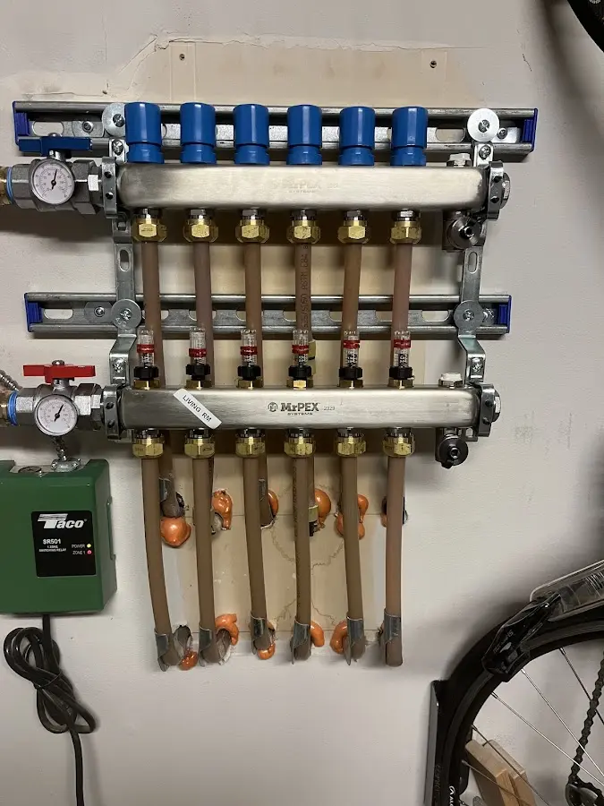 Plumber performing Water Heater Repair at a residential property in Carlsbad